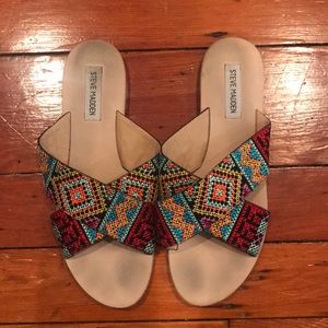 Steve Madden slides.